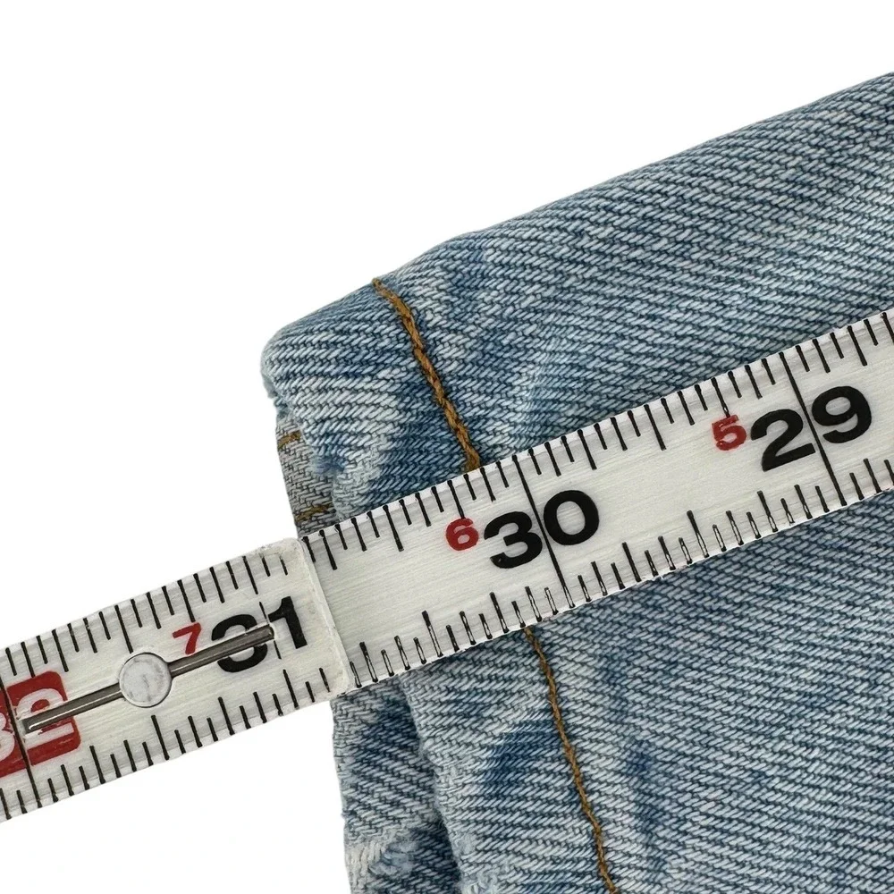 Vintage 2001 Levi's 550 Relaxed Tapered Jeans Tagged 33x31 Light Wash Y2K
